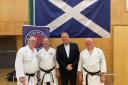 Sensei Velibor Dimitrijevic , second from left, with Councillor Alex Campbell and members of the Kelty Scottish Shotokan Academy.