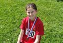 Evie Paterson,10,with her medal from the Fife Primary Schools Cross Country Championships.