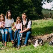 Stuart and Heather McDougall with daughters Ailsa and Iona on their farm at Blairadam. Pic: Eilidh Robertson
