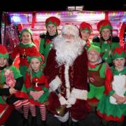Santa Benarty and his crew of elves will lead the Christmas Parade on Friday.