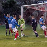 Cowdenbeath players turn to celebrate as Josh Jack's corner kick ends up in the back of the net.