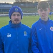 Brandyn Coventry, 16, pictured with Blue Brazil Football Club chairman Mark Marshall, made his Cowdenbeath debut from the bench on Saturday.