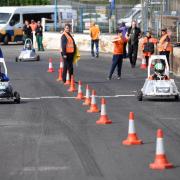 Kids race the electric carts at Racewall in Cowdenbeath. (Photo by David Wardle)