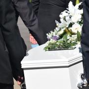 A Fife widow said she was hit with a £160 penalty by Fife Council for the late arrival of her husband's funeral cortege at the cemetery.