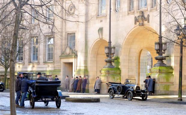 Central Fife Times: The cast of BBC's Peaky Blinders filming in Bolton last month