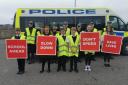 Pupils from St Bride's Primary School in Cowdenbeath help police take a Stand Against Speeding, a new campaign to get drivers to slow down. Photo: Police Scotland.