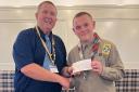 Cowdenbeath Rotary Club president Jim Stark with Crossgates scout Blair Cran.