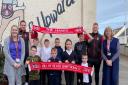 Hill of Beath Primary School pupils with Hill of Beath Hawthorn players Ross Allum and Michael Fleming.