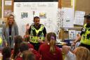 Fern Barclay, Kingdom’s Health & Safety Advisor with Community Officers from Police Scotland and children from Cardenden Primary School.