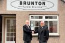 Colin Sneddon (right) acquires Brunton Funeral Directors from Neil Brunton in Leven.