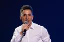 Russell Kane on stage during An Evening of Comedy for the Teenage Cancer Trust, at the Royal Albert Hall, London (James Manning/PA)