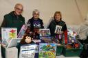 Sandra and Foodbank volunteers with toys donated for our appeal