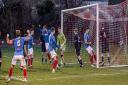Cowdenbeath players turn to celebrate as Josh Jack's corner kick ends up in the back of the net.