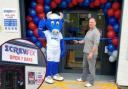 Councillor Darren Watt and Bluebell the Coo at the Screwfix opening ceremony.