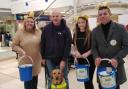 Karen and her family fundraising for Guide Dogs UK.