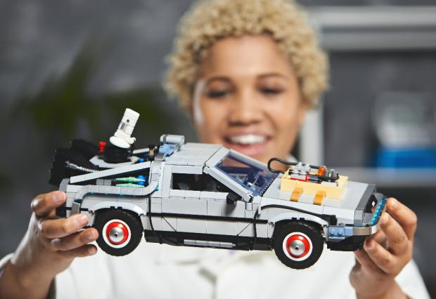 Central Fife Times: A woman holding the LEGO Back to The Future Delorean set. Credit: LEGO