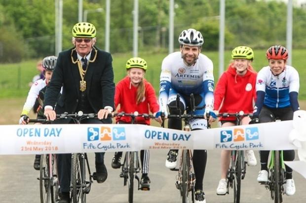 Provost Jim Leishman and Mark Beaumont open Fife Cycle Park in 2018 alongside local children and racing cyclist Eileen Roe.