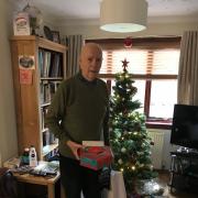 Joe Paterson, from Lochore, with some of the gifts he received from Fife Day Care Services after his retiral.