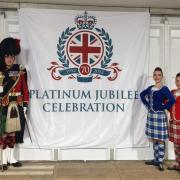 Senior drum major Allan Campbell, from Ballingry, with Benarty dancers Sinead and Elisha Scobie at the Platinum Jubilee celebrations at Windsor Castle.
