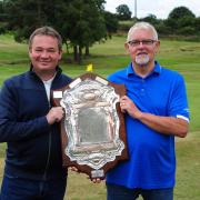 Barry Martin and Brian Robinson with the returned trophy. Photo: David Wardle.