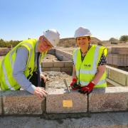 Councillor Judy Hamilton laid the 'golden brick' last August at the new affordable housing development in Lumphinnans. Photo: Fife Council.