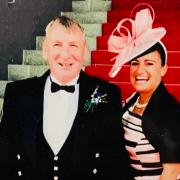 Karen Robertson with her husband Gary, who died from his injuries in a fall at Longannet Power Station in 2019. Photo: Family photo