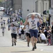 The Scottish Coal Carrying Championships returns to Kelty this summer. Colin Hattersley Photography.
