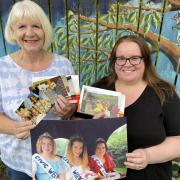 Liz Rae (left) and Vicky Kinloch, directors of My Cowdenbeath, holding some of the gala archive pictures from years gone by. Photo: Stuart Duffy.