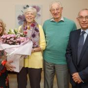 David and Anne Taylor are congratulated by Councillor Linda Erskine and Deputy Lieutenant Jim Kinloch.