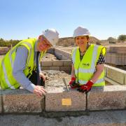 Councillor Judy Hamilton laying the 'golden brick' at the new housing development on Lochgelly Road last year.